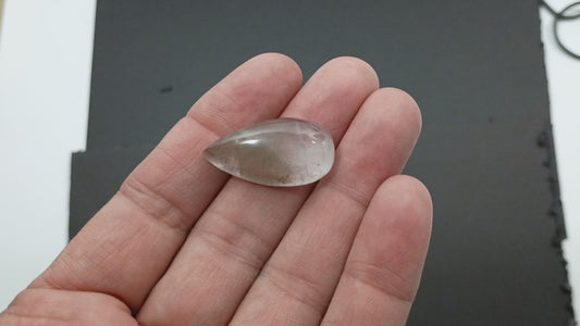 Calcite Cabochon with wild inclusions