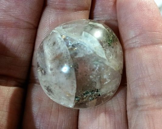 Calcite Cabochon with interesting inclusions