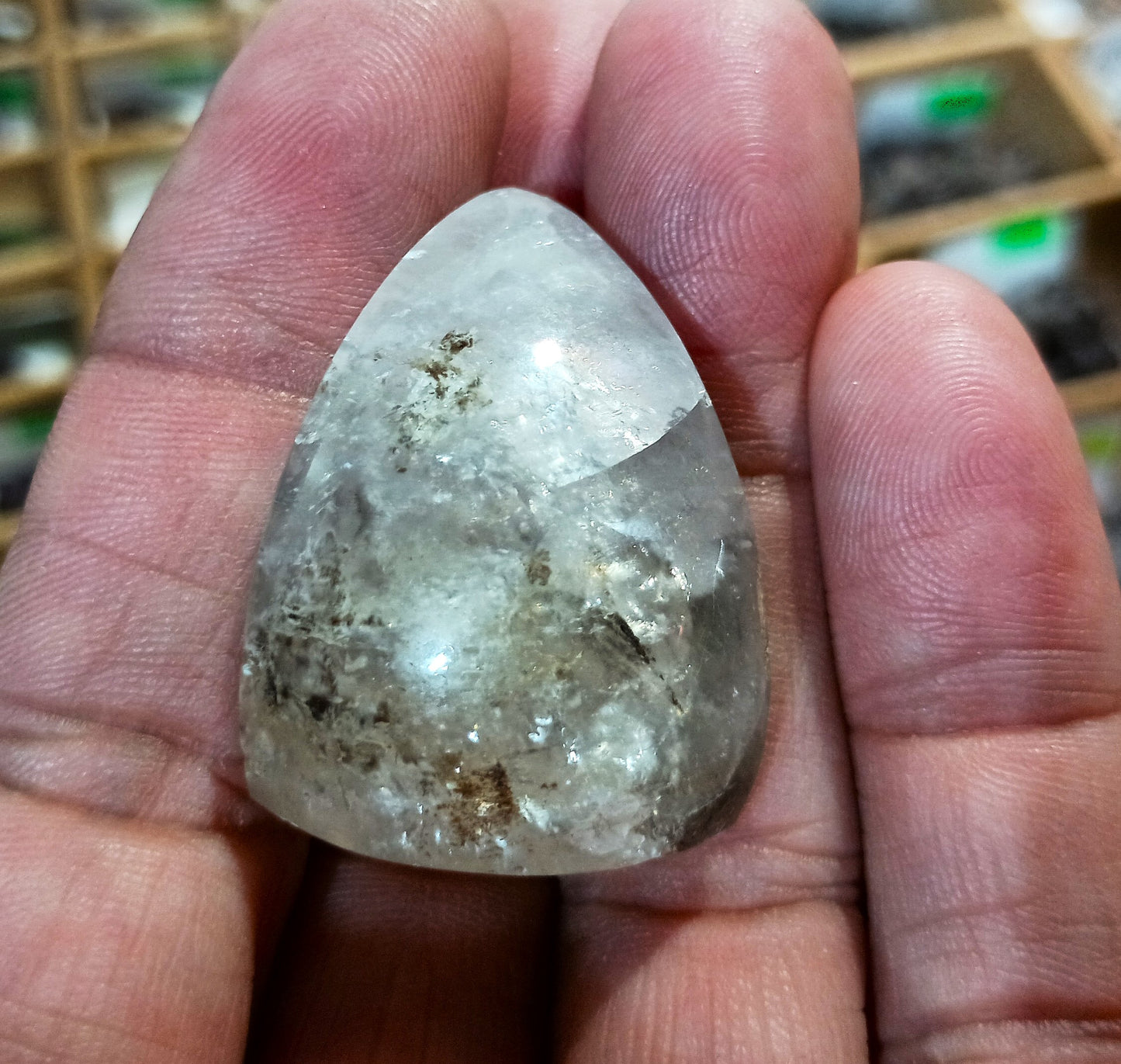 Calcite Cabochon with interesting inclusions