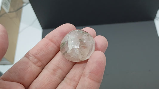Calcite Cabochon with interesting inclusions